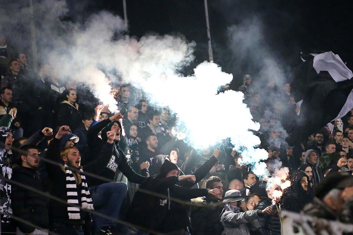 FK Partizan supporters light flares in the stands during a match in Belgrade (Photo: Aubrey Belford)