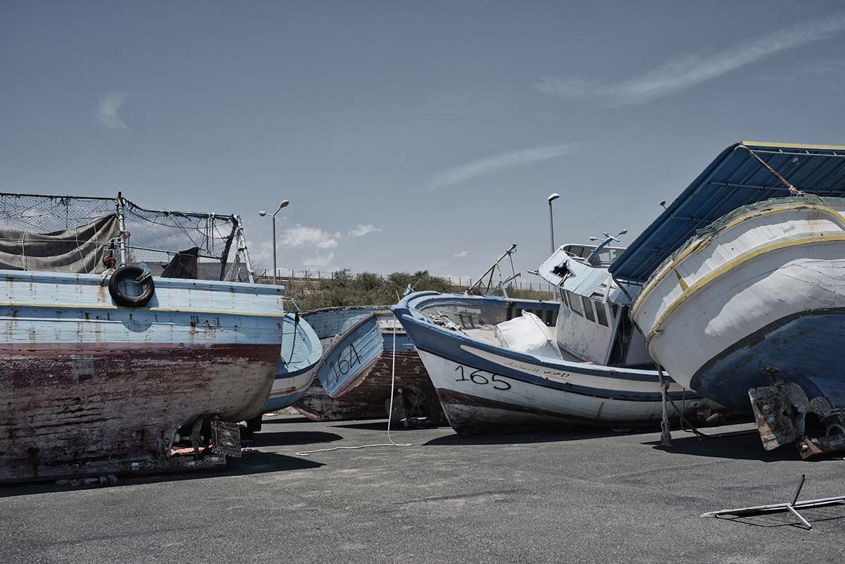 Confiscated wooden boats used by smugglers at the harbor in Pozzallo, Sicily (Photo: Valentino Bellini)