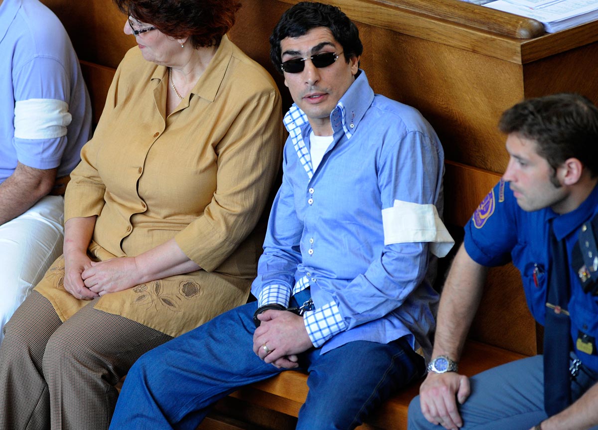 Police say Andranik Soghoyan, in blue shirt, is a ‘vor v zakone,’ or thief-in-law, who headed an organized crime group in Prague. (Czech Press Agency photo)