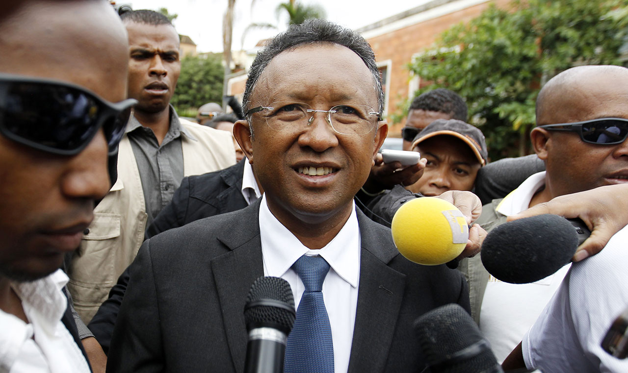 Hery Rajaonarimampianina meets supporters at a polling centre in the Tsimbazaza district of Madagascar's capital Antananarivo in the run up to presidential elections in 2013. Credit: Thomas Mukoya / Reuters