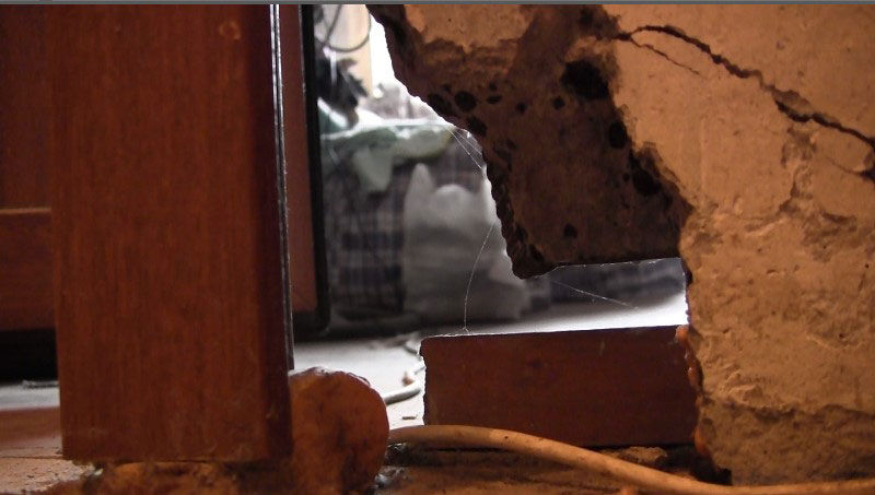 A broken wall in the home of Shamil Aliyev, now serving a prison term for a million-dollar tax liability.