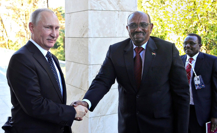 Russian President Vladimir Putin meeting Sudanese president Omar al-Bashir