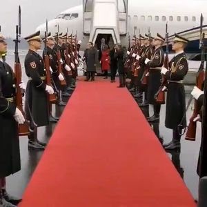 President Nicos Anastasiades on a red carpet after walking off a private jet