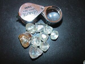 Several large diamonds on a table