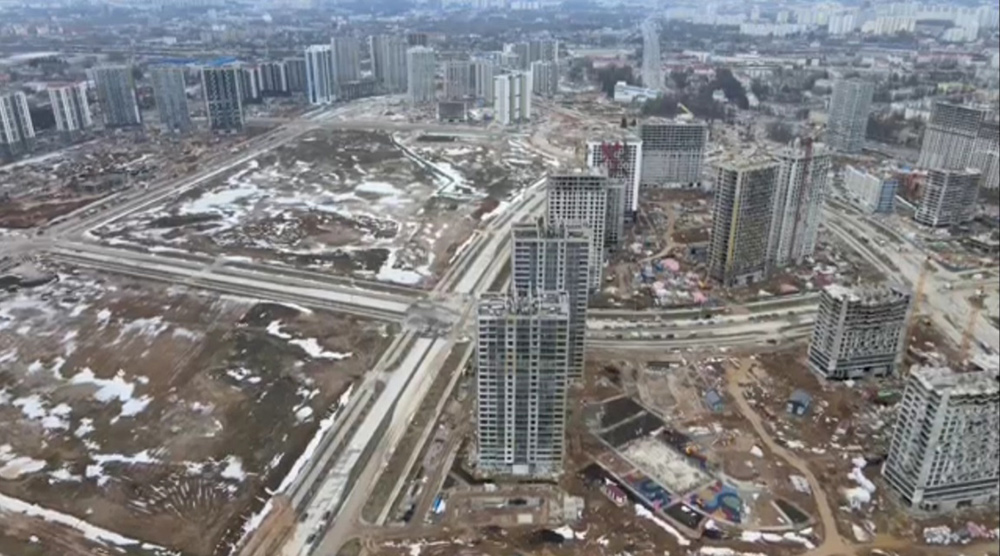 A top-down view of an abandoned city with tall buildings