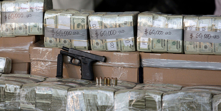 Seized cash is stacked in $60,000 blocks