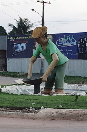 A statue of a prospector