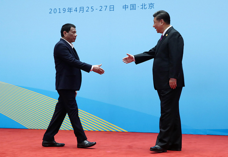 China's President Xi Jinping welcomes Philippines President Rodrigo Duterte