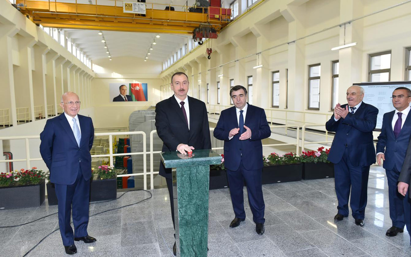 Azerbaijani President Ilham Aliyev stood with Erdal Aksoy and Ahmad Ahmadzada