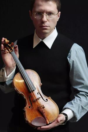 Viktorov with a violin he purchased