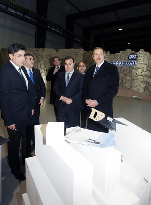 Kamilov and president Aliyev stand with other attendees