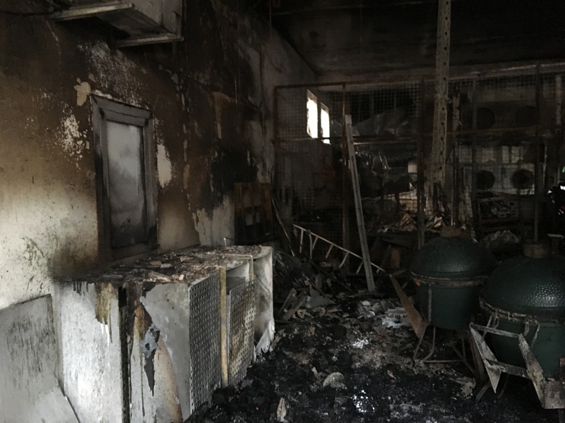 A damaged storage room and kitchen