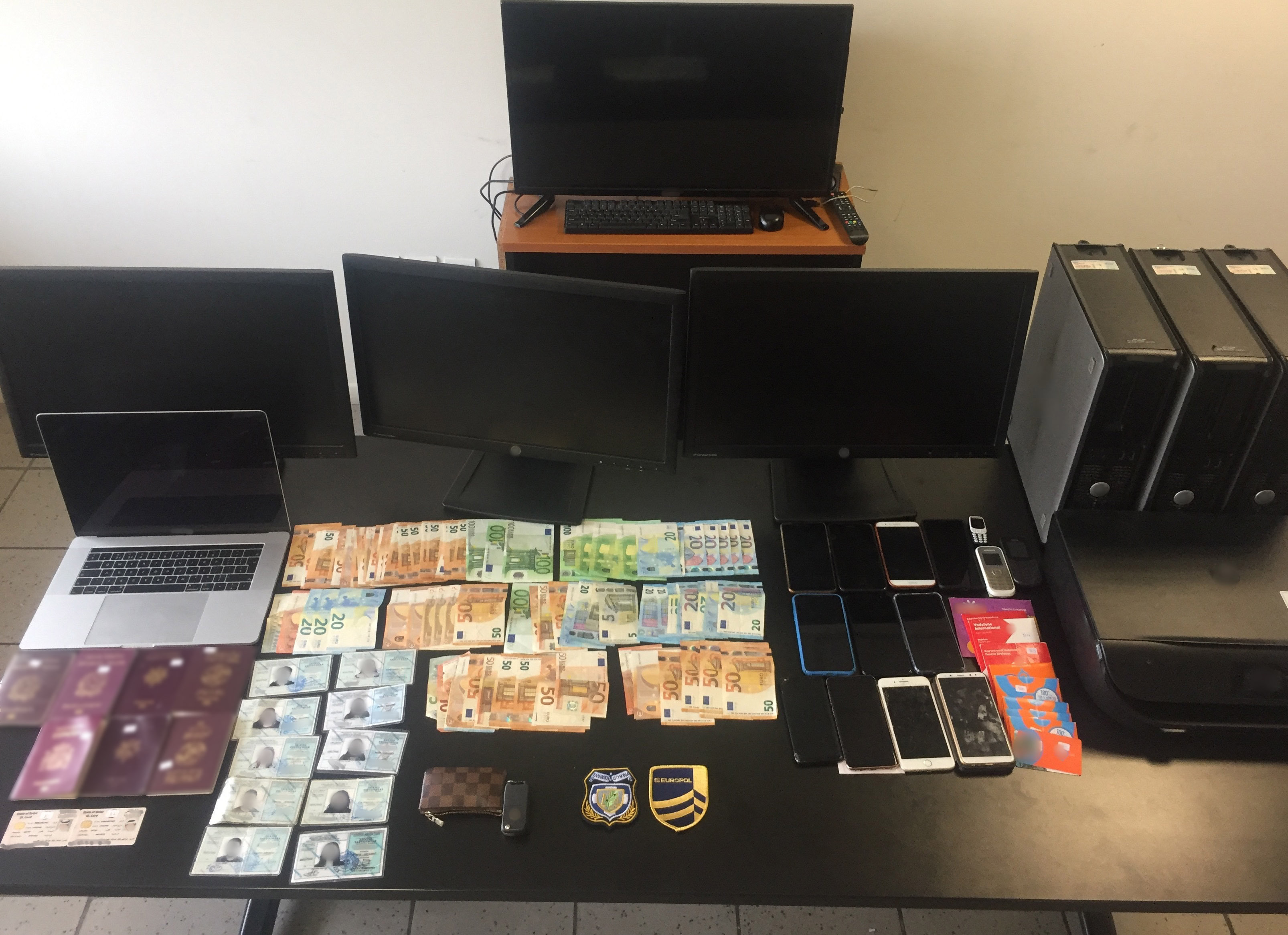 Police seized documents, cash, phones and computers during last week's raid. (Source: Hellenic Police)