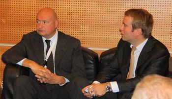 Dmitry Klyuev (left) and Andrei Pavlov (right) at an OSCE meeting in Monaco, in July 2012