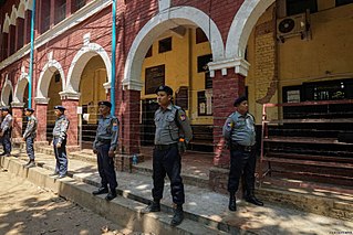 320px-Myanmar Police outside Insein Township courtroom Aung Naing Soe-VOA