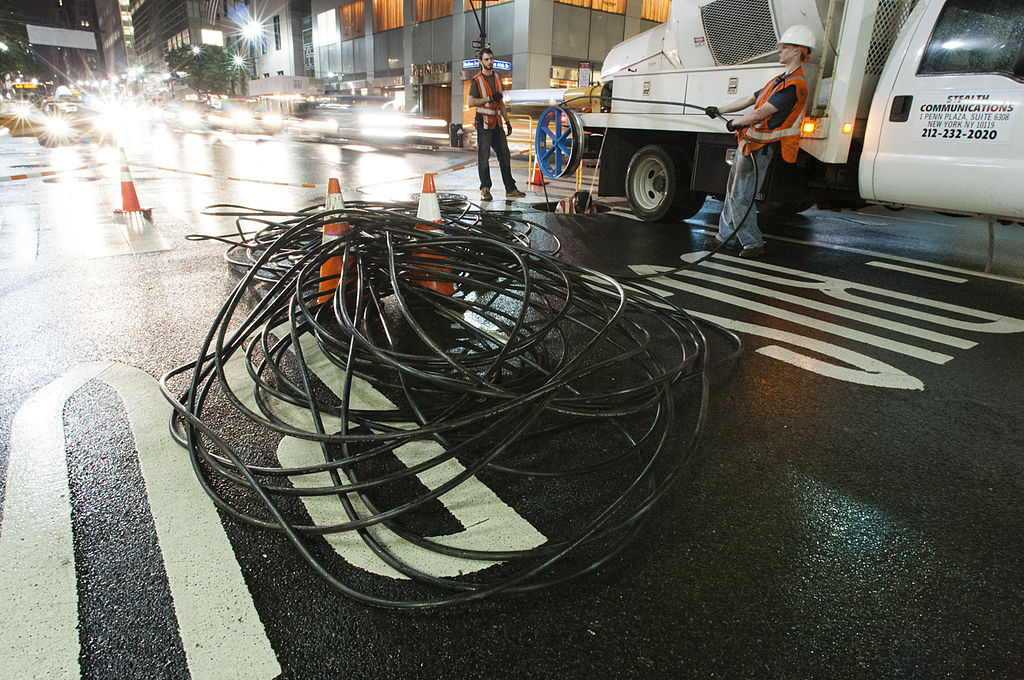 Crew Installing Fiber Cables Beneath Manhattan small