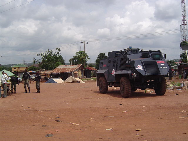 Nigerian Mobile Police with Vehicle