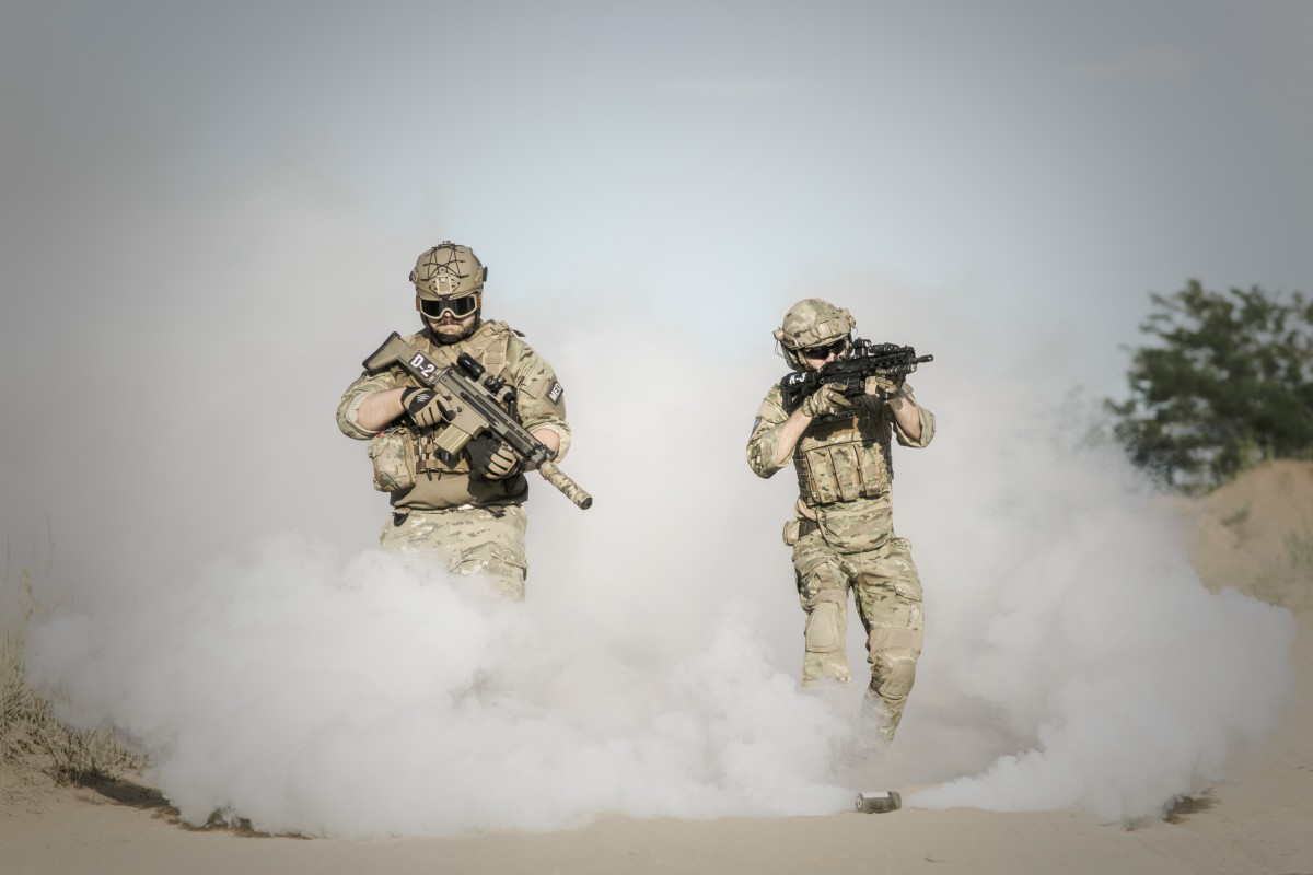Soldiers Smoke Weapons