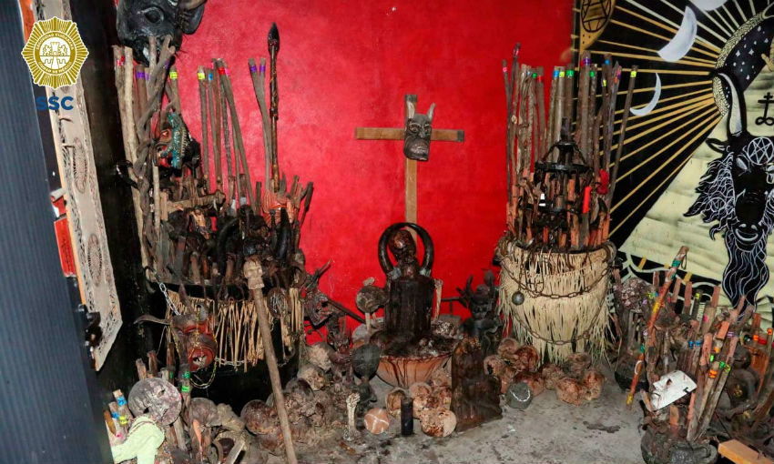 Skulls are seen at an altar discovered during a raid in Mexico City. (Source: Secretaría de Seguridad Ciudadana de la Ciudad de México)