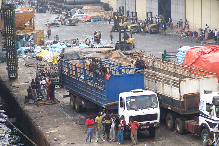 Dockworkers in Abidjan’s port, Ivory Coast. (Photo: Romain Seaf)