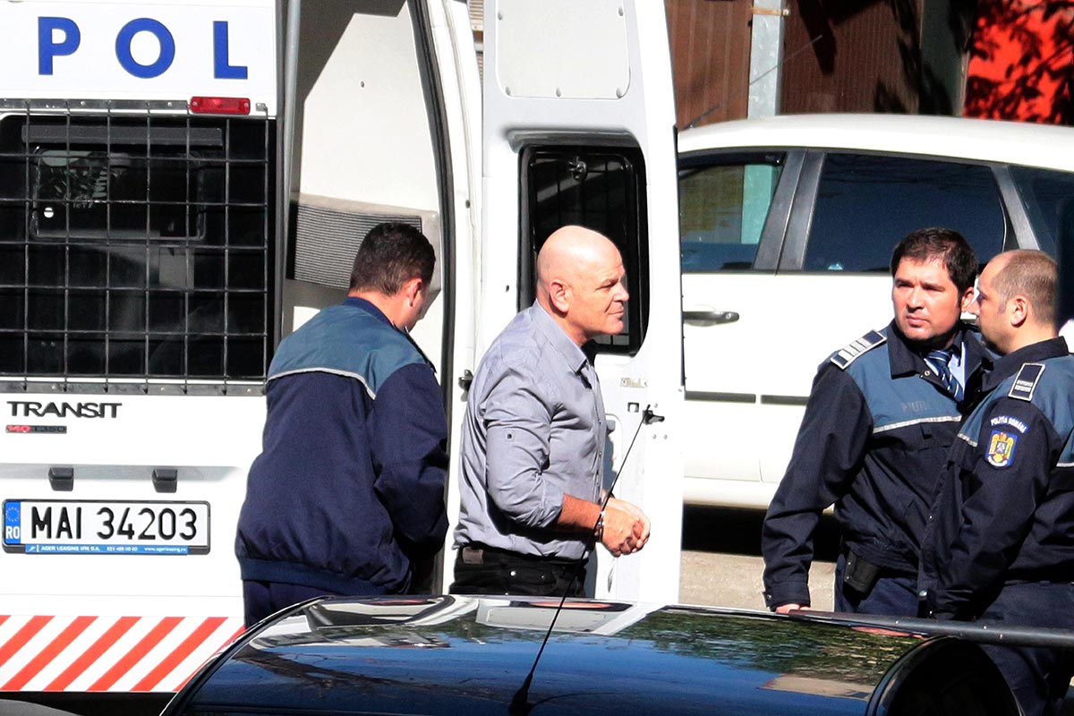 Avraham Morgenstern in police custody on April 9, 2014, a day after being held by anti-corruption prosecutors. (Photo: Liviu Untaru/MediafaxFoto)
