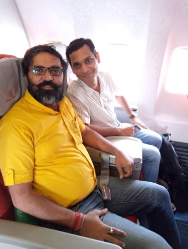 Captain Ripusad Prasad, on the left, flying home from Nigeria with his chief engineer