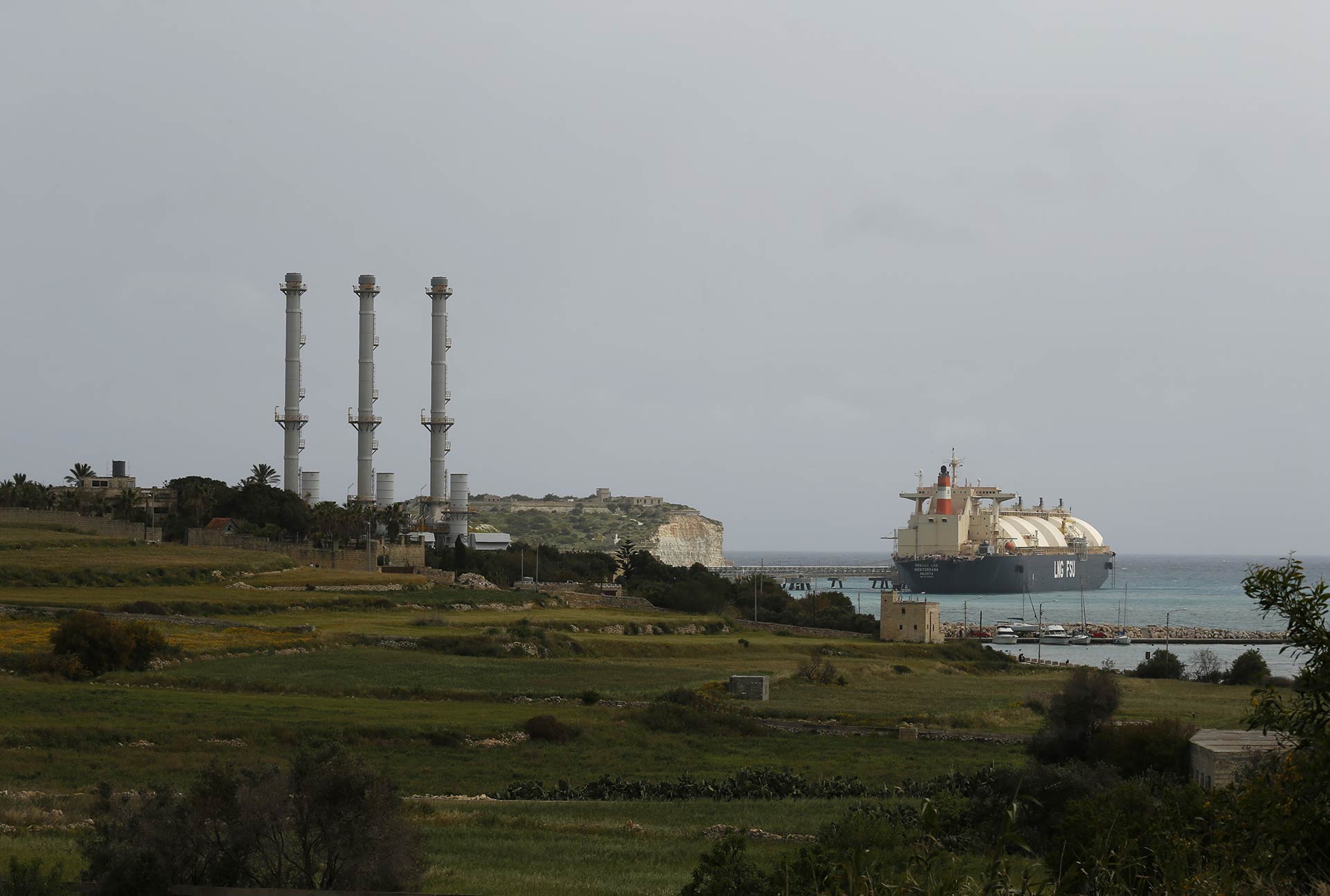 An LNG tanker moored off the village of Marsaxlokk, location of the recently constructed Delimara Power Station, which runs on natural gas. Credit: Reuters