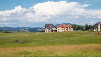 How Group America’s Money Feeds the Balkan Economy