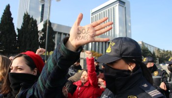 Azerbaijan Widens Media Crackdown with Two Arrests